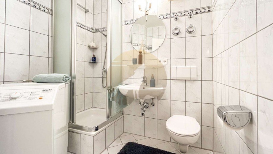 wohnung-baden-baden-badezimmer-wolf-immobilien Etagenwohnung Baden-Baden