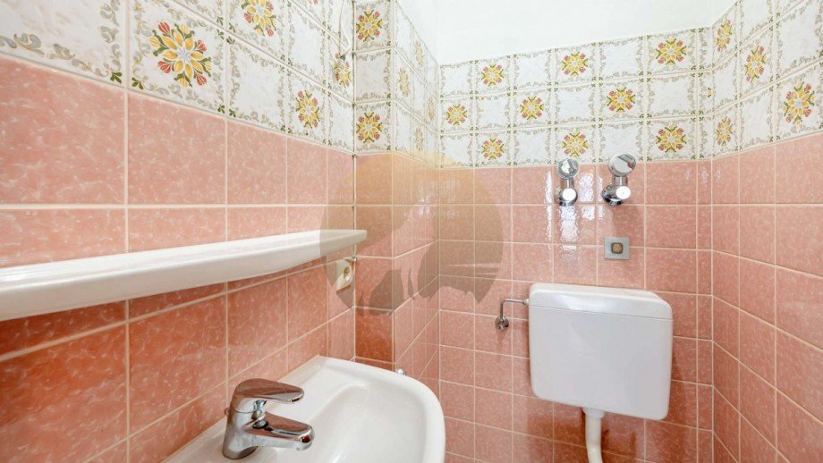 wohnung-baden-baden-toilette-wolf-immobilien Etagenwohnung Baden-Baden