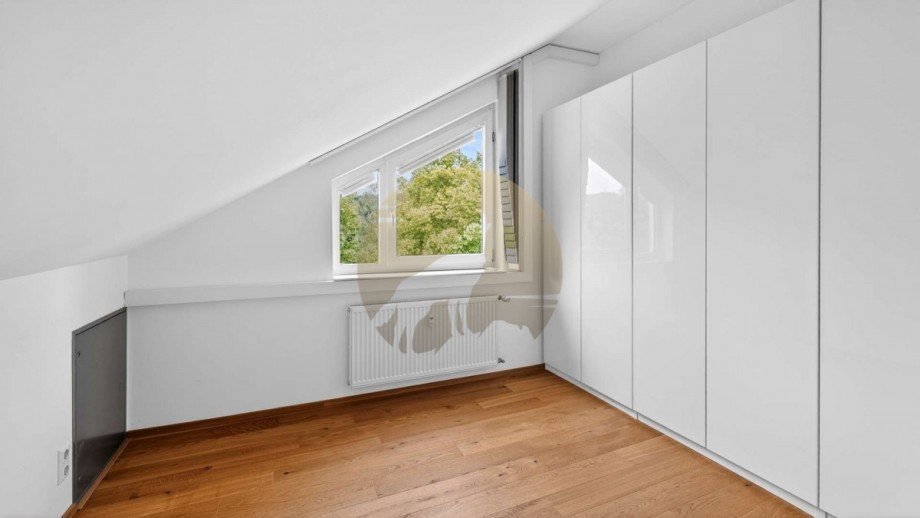 wohnung-baden-baden-zimmer-2-wolf-immobilien Dachgeschosswohnung Baden-Baden
