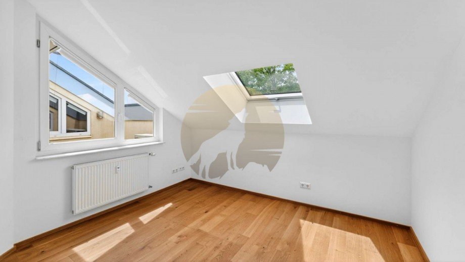 wohnung-baden-baden-zimmer-1-wolf-immobilien Dachgeschosswohnung Baden-Baden