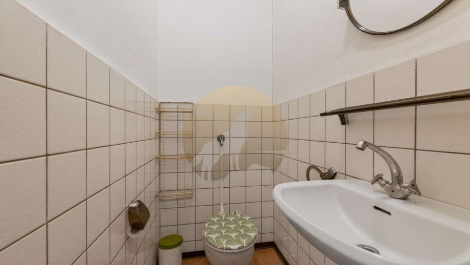 Toilette EG Mehrfamilienhaus Gaggenau