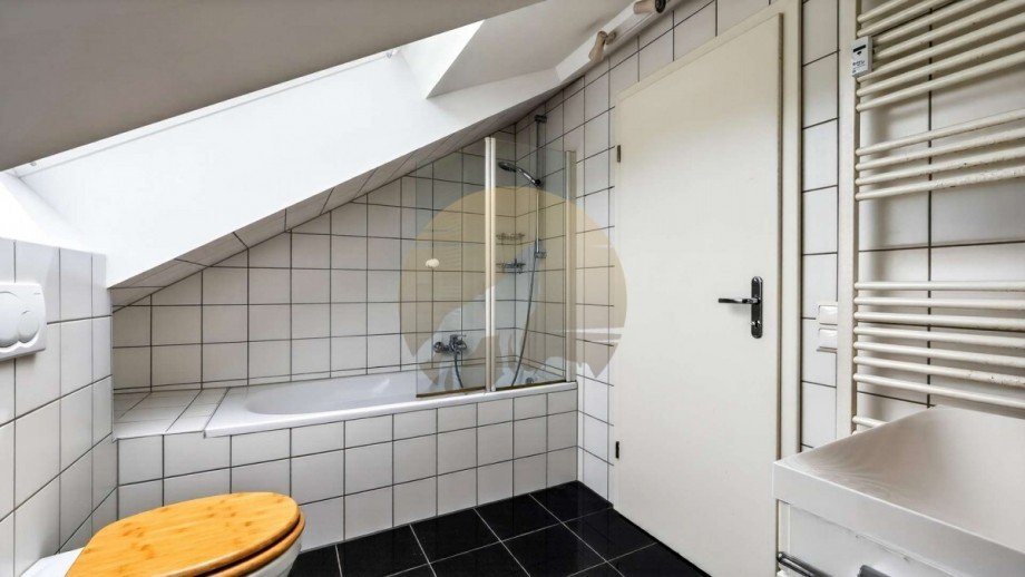 wohnung-baden-baden-badezimmer-wolf-immobilien Dachgeschosswohnung Baden-Baden